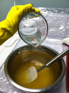 adding lye mixture to oils